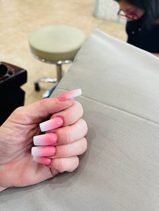 T K Nails