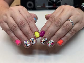 Hannah E. Nails